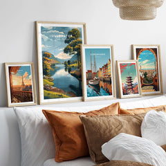 Ullswater Lake District Green Trees Lakeside Print - English Countryside Poster displayed among framed artworks on a bed.