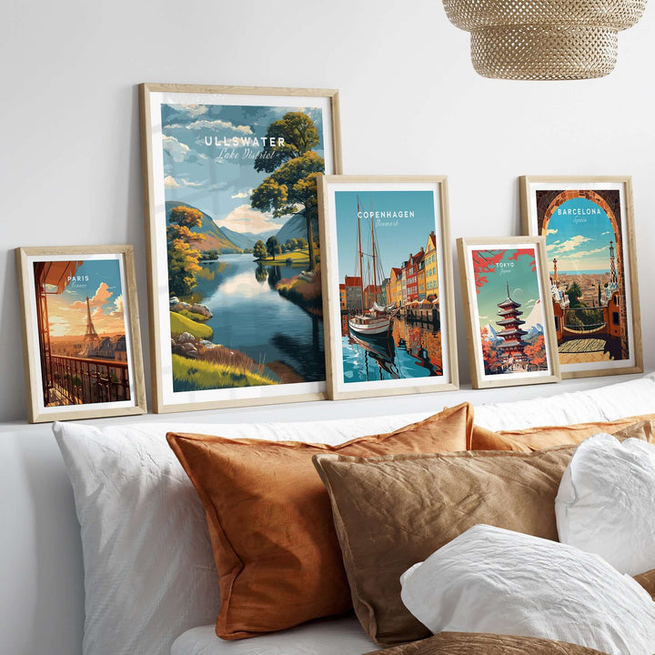 Ullswater Lake District poster displayed with other cityscape prints in a stylish living room setting.