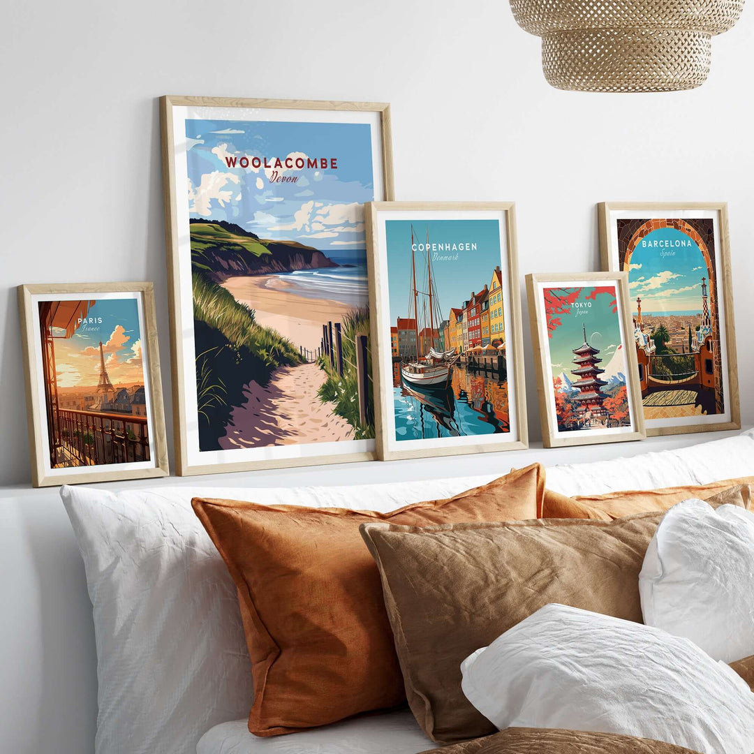 Framed Woolacombe Beach Path print and cityscapes, showcasing coastal Devon wall art in a stylish home decor setting.