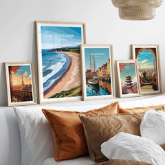 Woolacombe Devon Long Beach Sunset Poster - Rolling Waves Print displayed with other travel posters in a stylish interior setting.