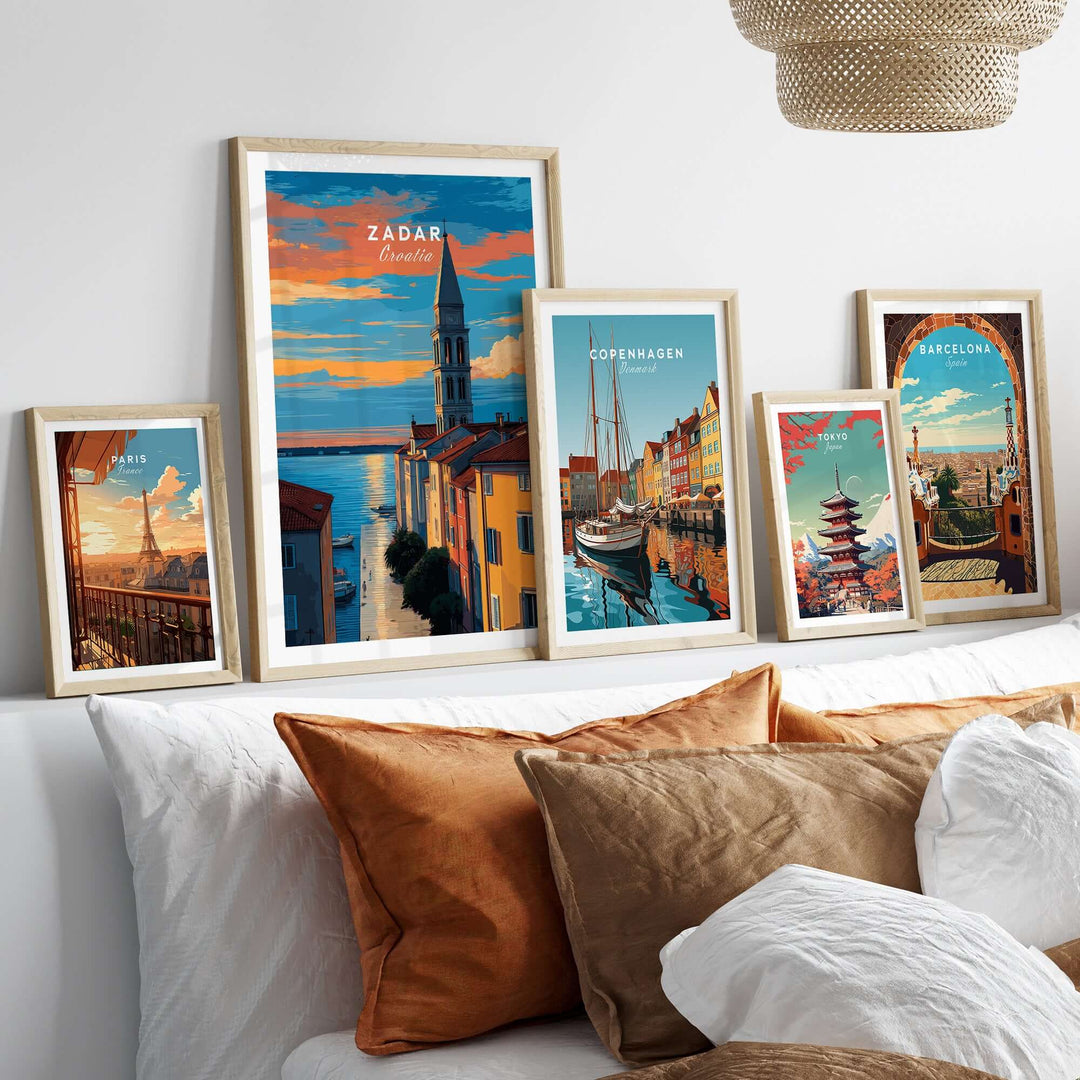 Zadar Poster - Dalmatian Coast Twilight View Print | Croatian Home Decor framed with other city posters on a couch.