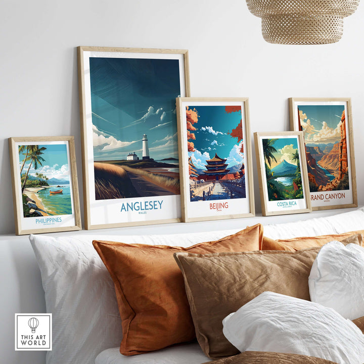 Framed travel posters including Anglesey, Beijing, and Costa Rica on a stylish decor display.