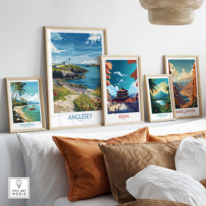 Framed travel prints of Anglesey, Philippines, Beijing, Costa Rica, and the Grand Canyon displayed in a stylish living room setting.
