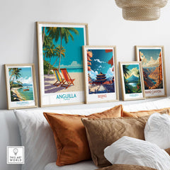 Anguilla Caribbean Sunset Poster - Island Travel Print displayed among other travel posters on a stylish shelf.