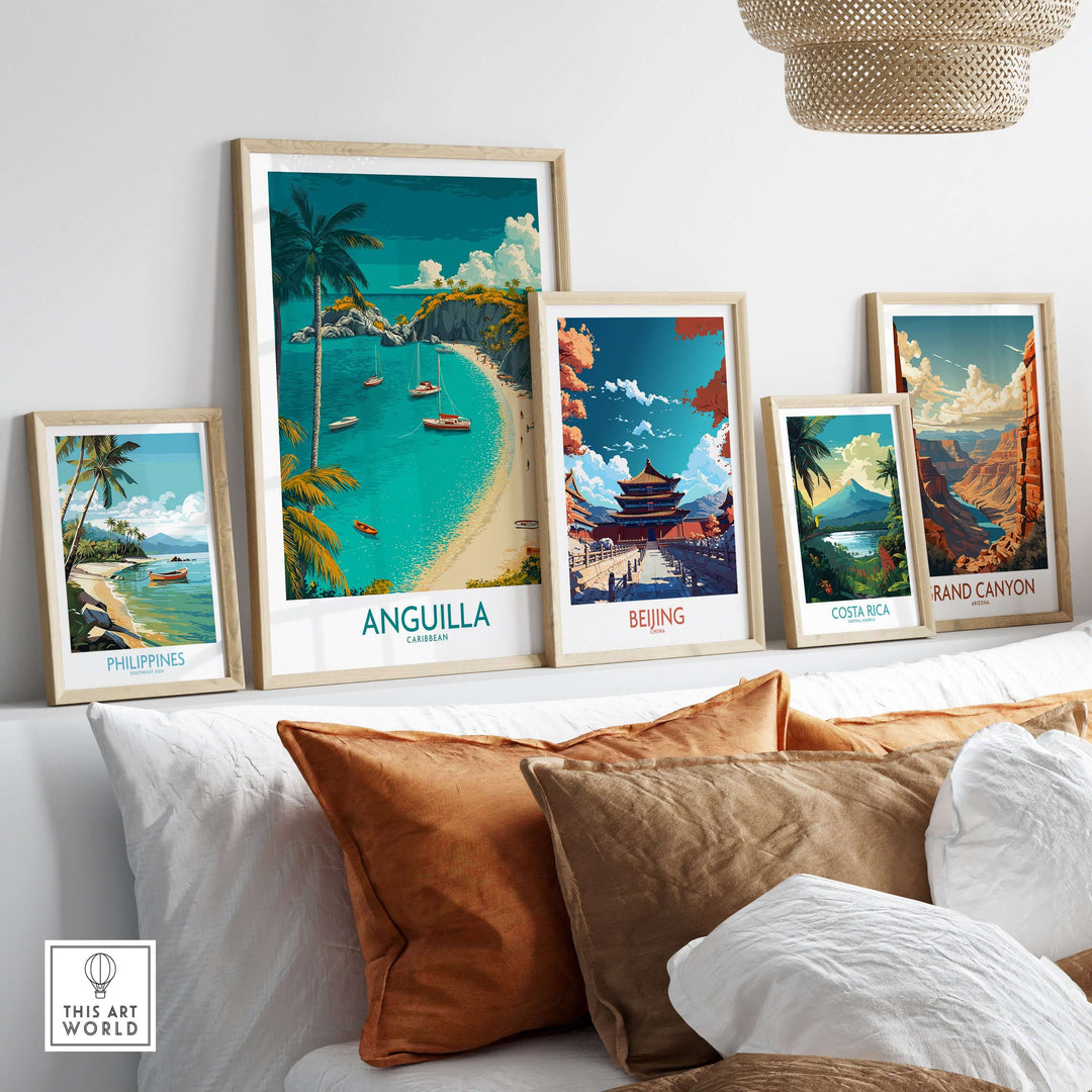 Gallery wall featuring framed travel posters of Anguilla, Beijing, Costa Rica, and the Grand Canyon in a cozy interior.