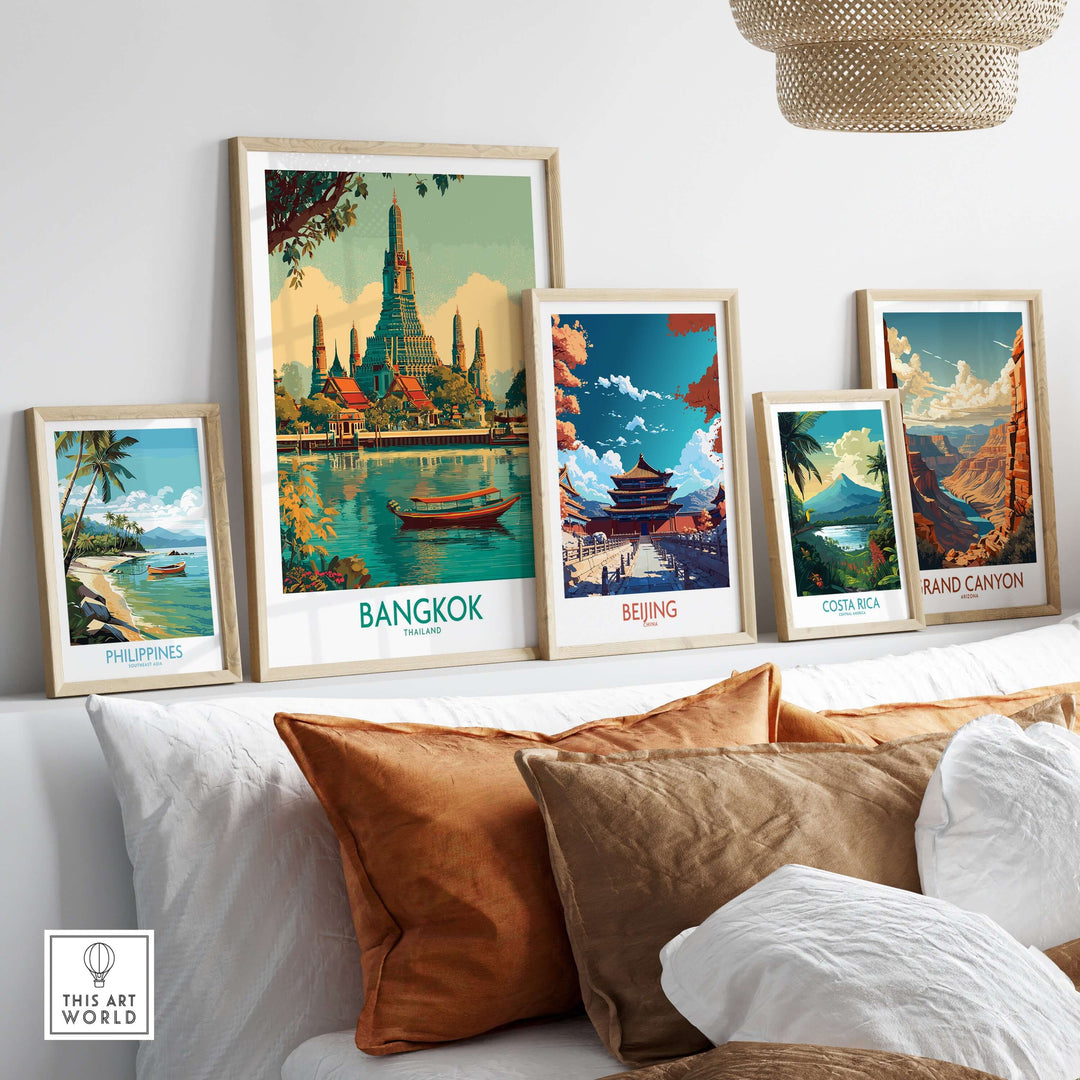 Framed travel posters featuring Bangkok, Beijing, Costa Rica, and the Grand Canyon on a stylish wall display.
