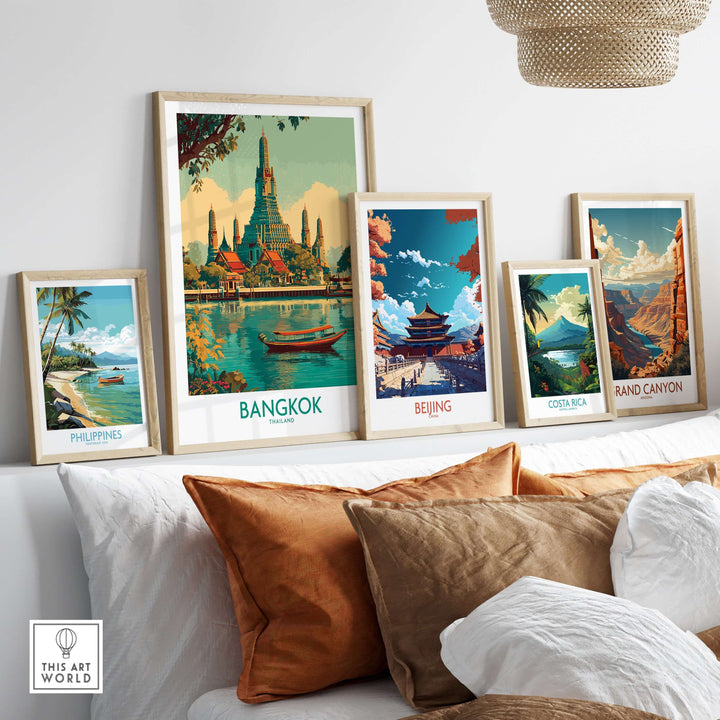 Framed travel posters featuring Bangkok, Beijing, Costa Rica, and the Grand Canyon on a stylish wall display.