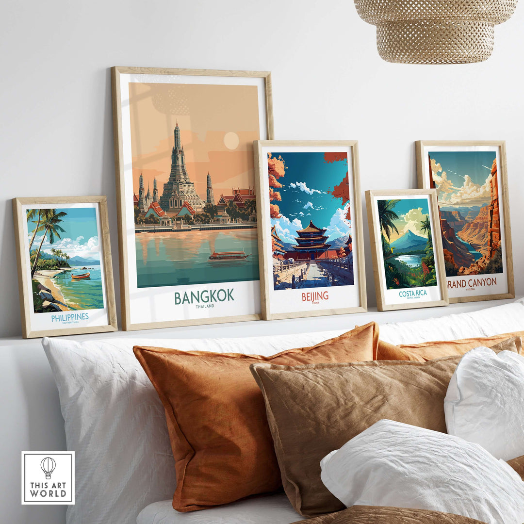 Collection of travel posters featuring Bangkok, Beijing, Costa Rica, the Philippines, and the Grand Canyon in a stylish setting.
