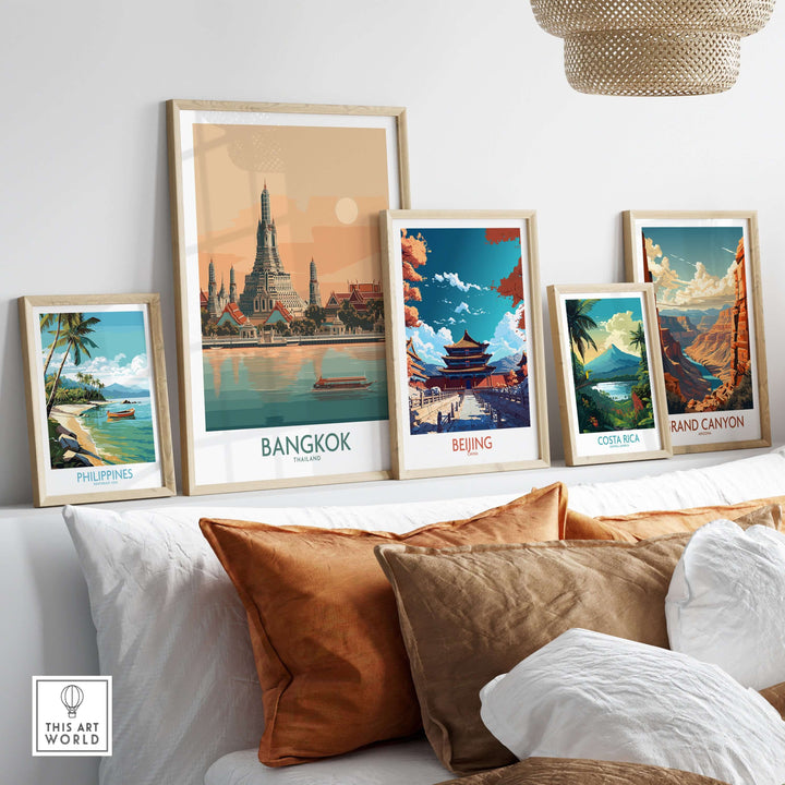 Collection of travel posters featuring Bangkok, Beijing, Costa Rica, the Philippines, and the Grand Canyon in a stylish setting.