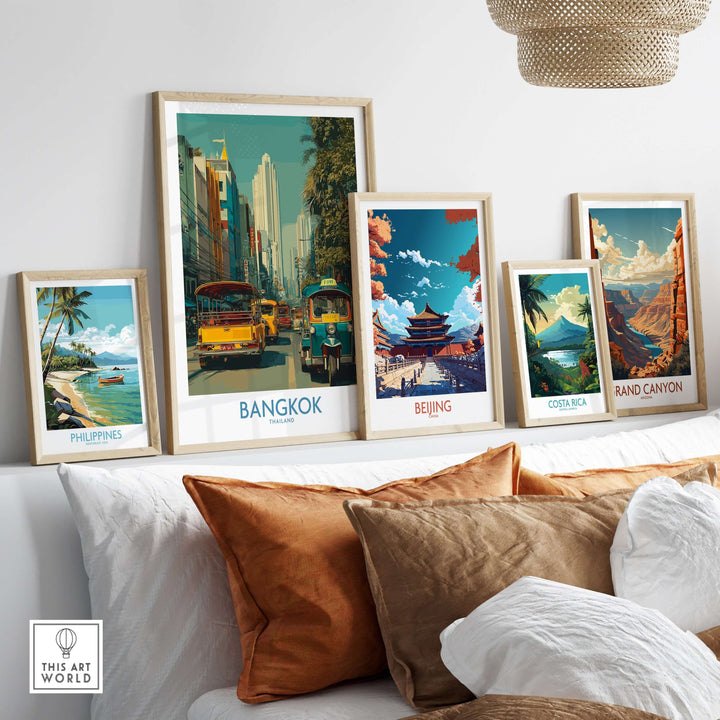 Colorful travel prints showcasing Bangkok and other destinations on a stylish wall display.