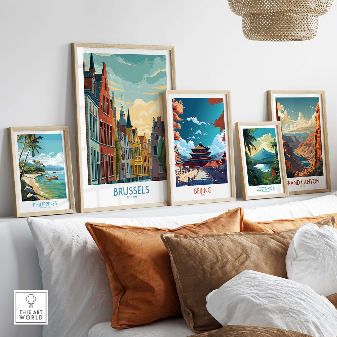 Framed travel posters showcasing Brussels, Beijing, Costa Rica, the Philippines, and the Grand Canyon in a stylish home setting.