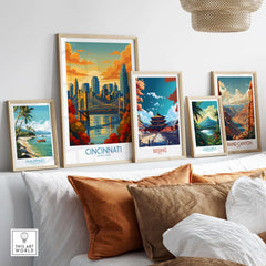 Cincinnati Skyline Print - Ohio Autumn Cityscape Decor displayed among other framed art prints on a cozy sofa.