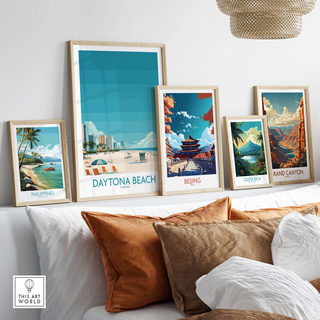Artistic display of framed tropical posters, featuring Daytona Beach, Philippines, Beijing, Costa Rica, and Grand Canyon.