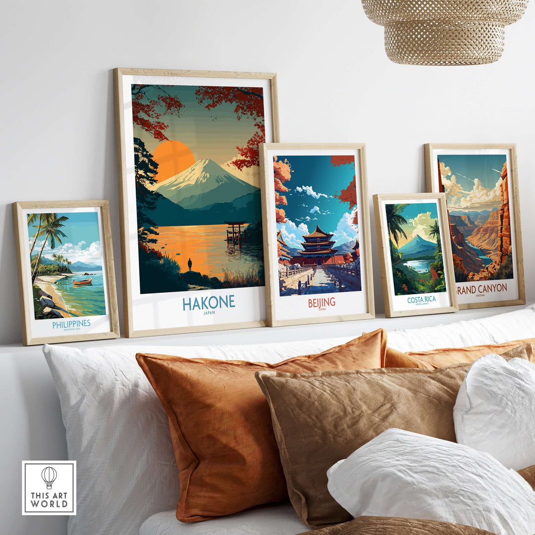Framed wall art featuring scenic prints of Hakone, Beijing, Costa Rica, the Grand Canyon, and the Philippines.