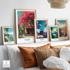 Hanoi Vietnam Poster - Historic Hanoi Scene Decor displayed among other travel posters on a stylish sofa.
