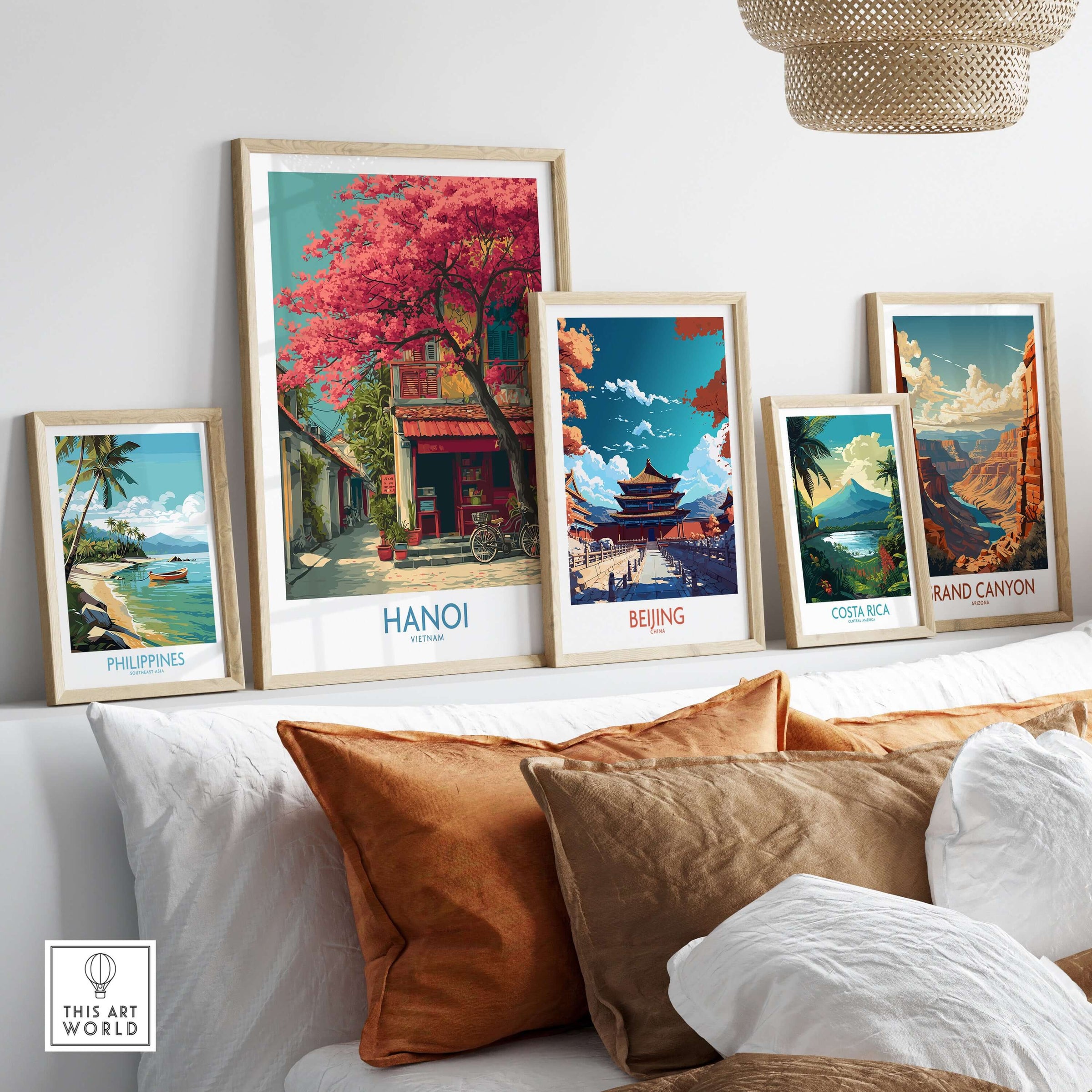 Hanoi Vietnam Poster - Historic Hanoi Scene Decor displayed among other travel posters on a stylish sofa.