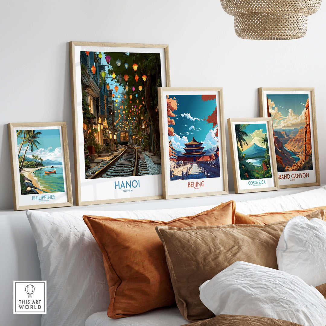 Colorful Hanoi Train Street wall art print surrounded by travel posters from various locations.