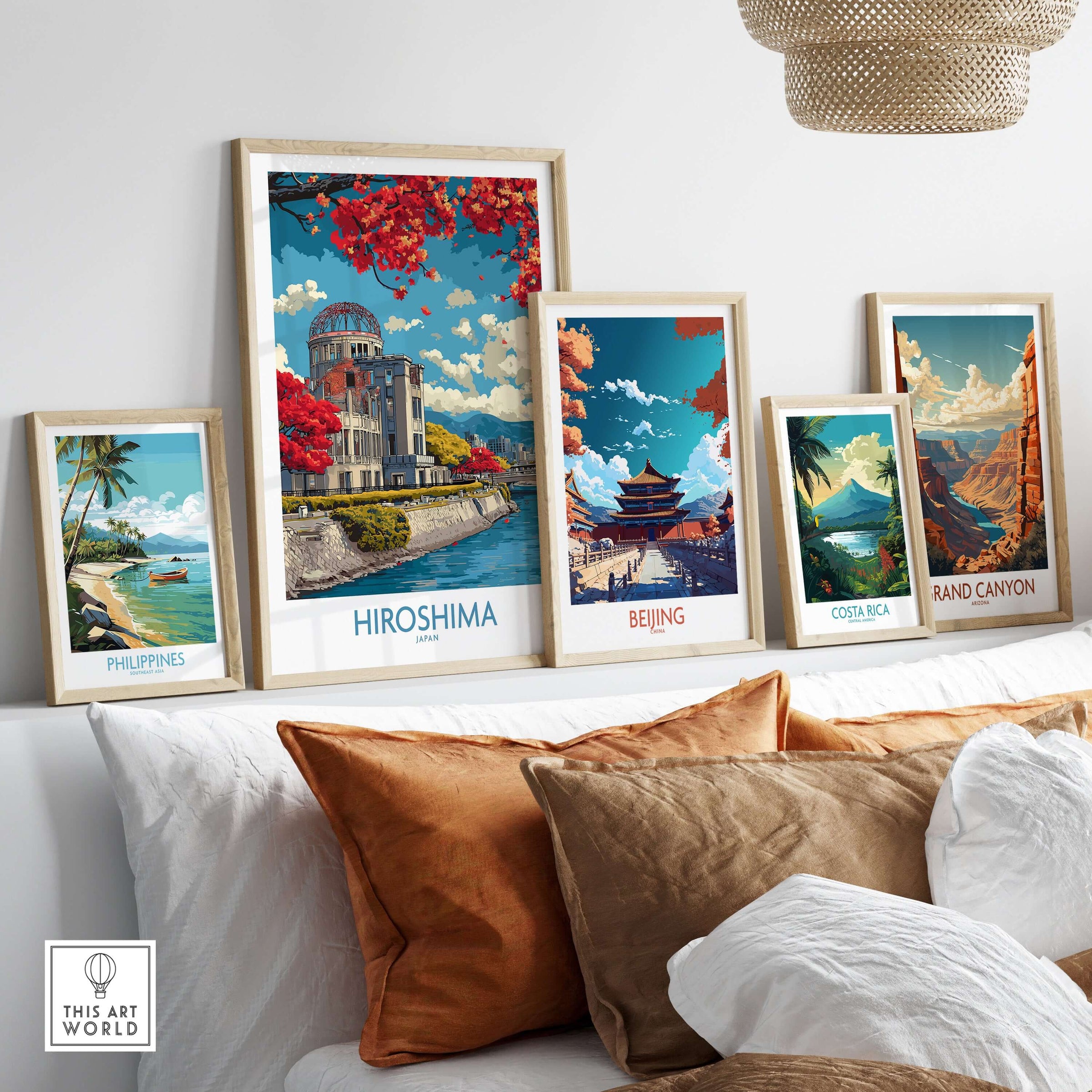 Hiroshima Japan Genbaku Dome Poster - Historic Landmark Decor displayed among travel posters on a cozy sofa.