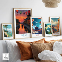Hoi An Wall Art Vietnam - River Boats Poster displayed among other travel posters on a stylish sofa.