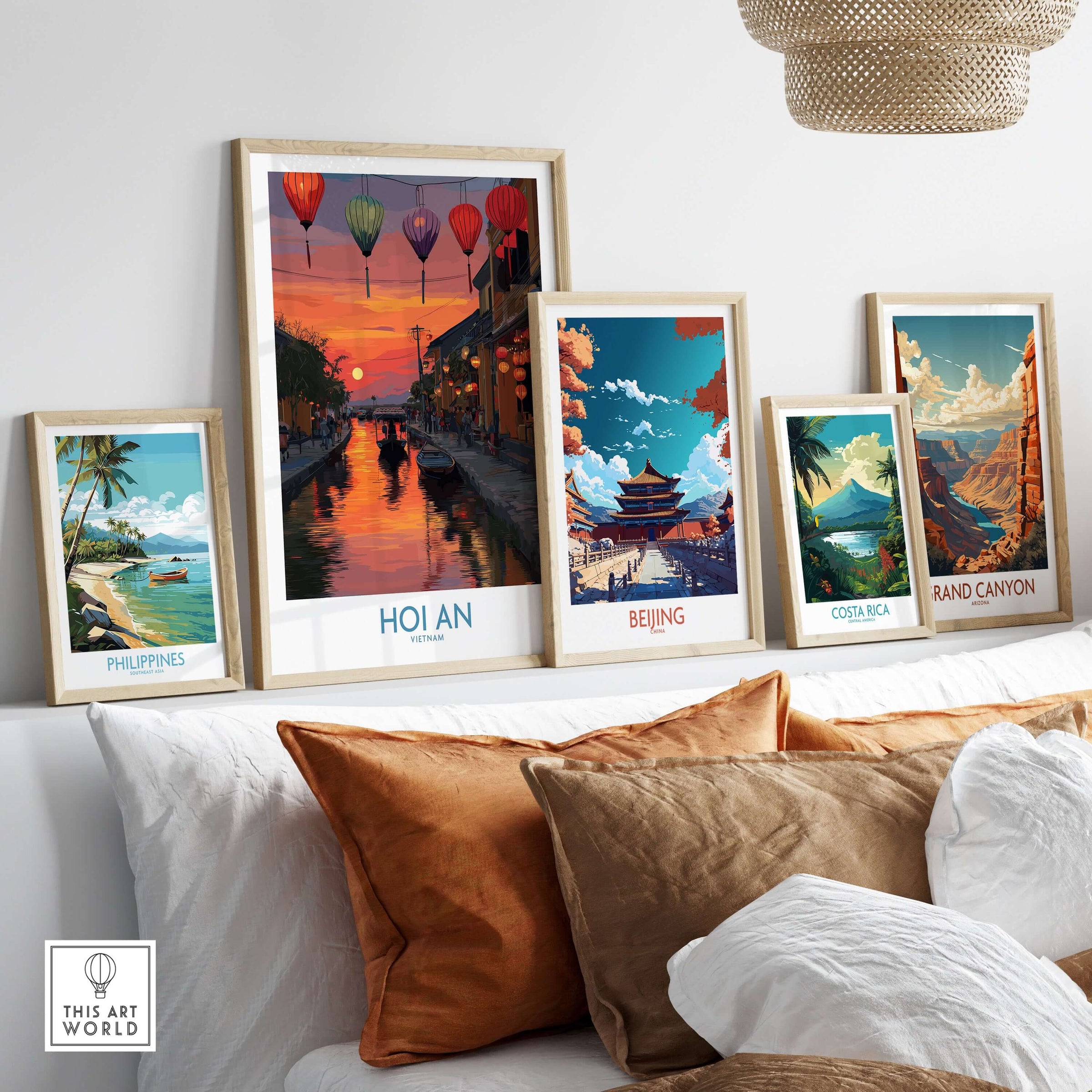 Hoi An Wall Art Vietnam - River Boats Poster displayed among other travel posters on a stylish sofa.