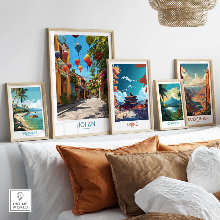 Gallery of framed artwork featuring Hoi An lanterns and landscapes from the Philippines, Beijing, and Costa Rica.