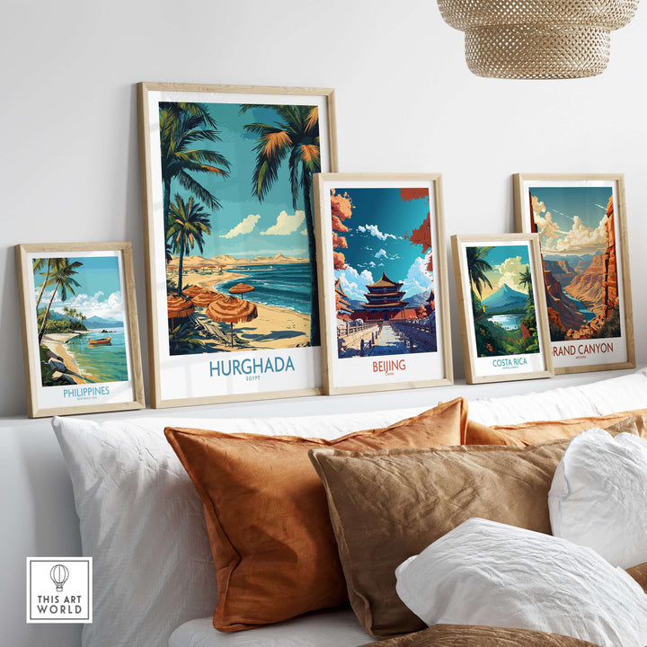 Framed travel posters featuring Hurghada, Beijing, Costa Rica, Grand Canyon, and Philippines on a stylish couch.