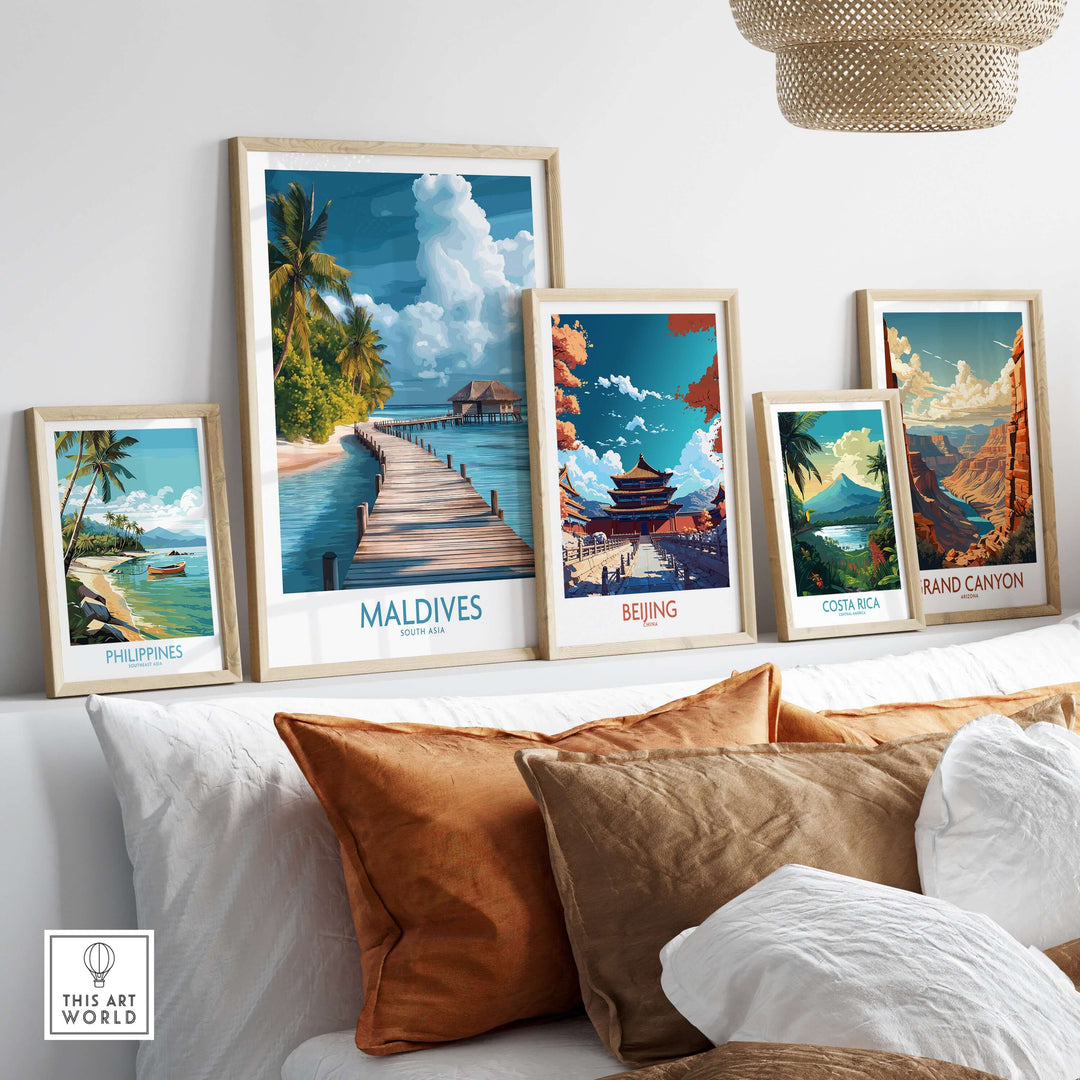Maldives Wall Art Print - Beach displayed among other travel art prints on a cozy couch.