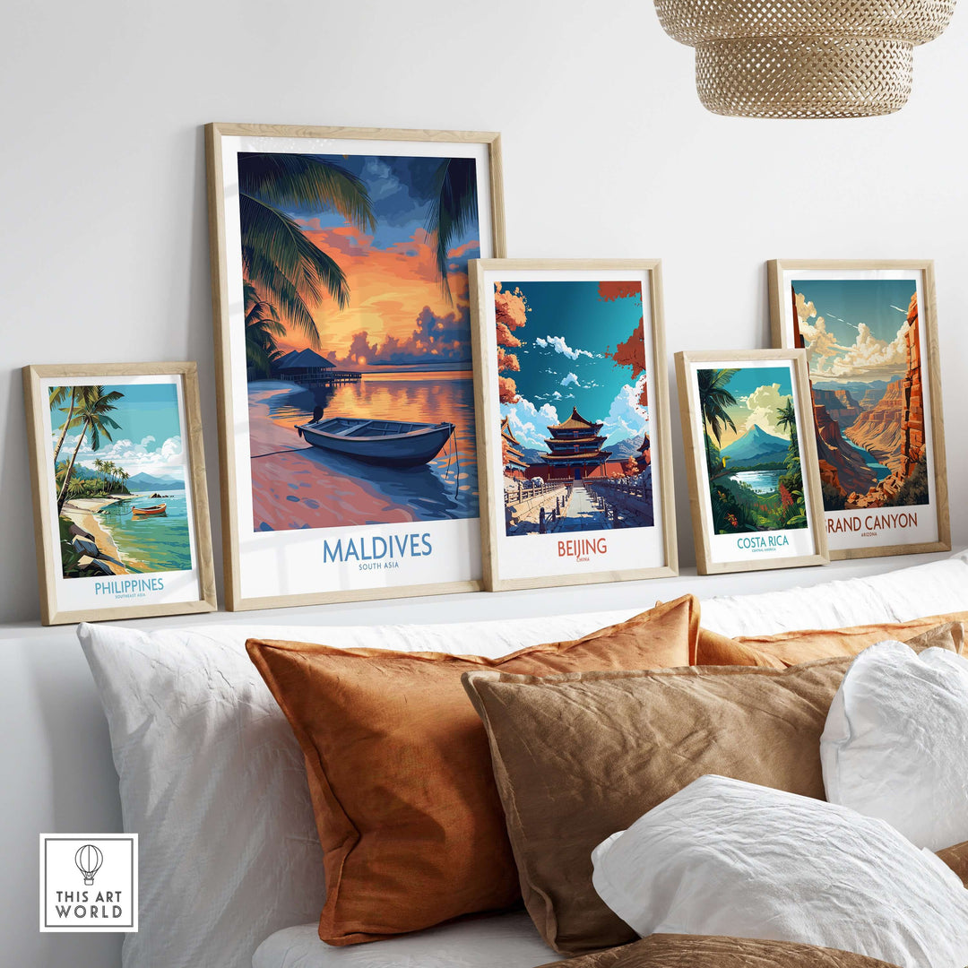 Maldives Wall Art Print - Sunset displayed among framed travel prints in a living room setting.
