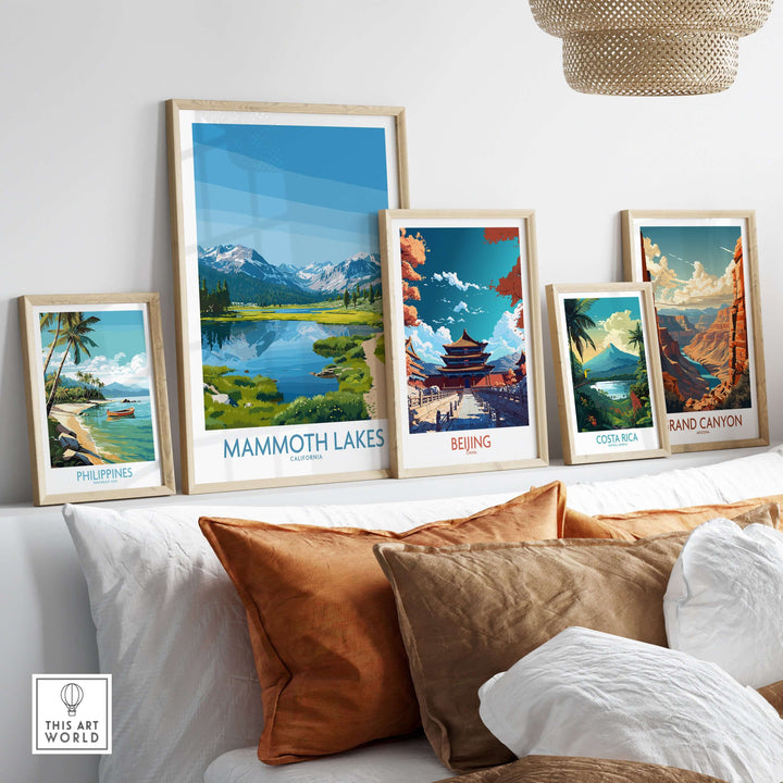 Framed Mammoth Lakes wall art alongside travel prints of Costa Rica, Beijing, and the Philippines, showcasing beautiful landscapes.
