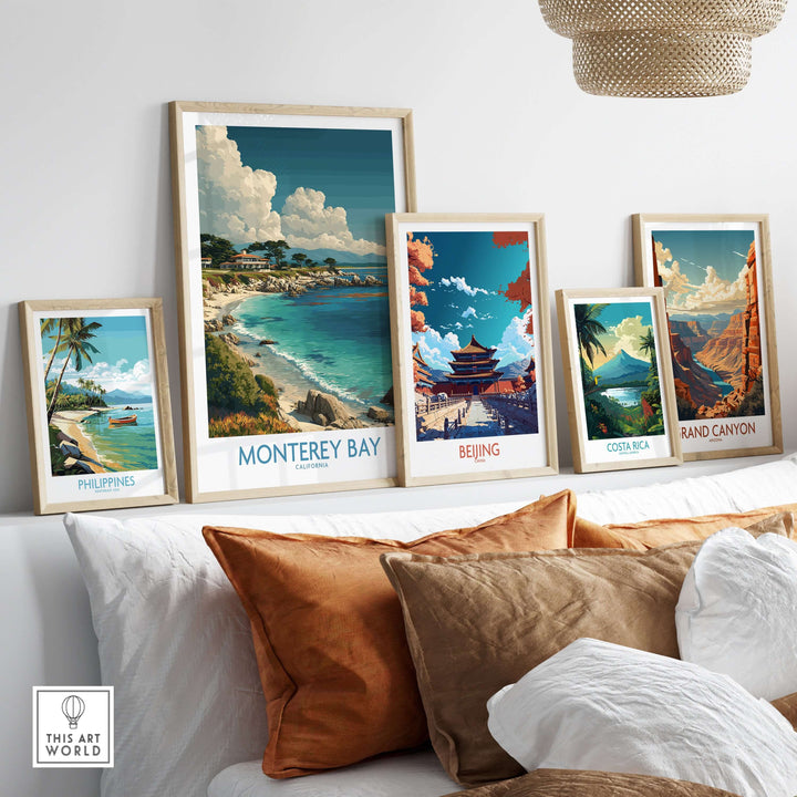 Framed travel posters displaying Monterey Bay, Philippines, Beijing, Costa Rica, and Grand Canyon in a stylish home setting.