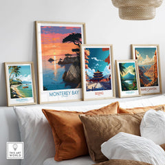 Monterey Bay Poster California Coastal Decor showcased with other travel-themed art prints on a stylish wall.