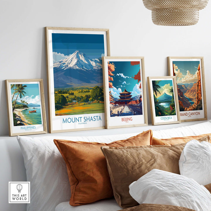Framed Mount Shasta poster displayed among other travel posters in a cozy room setting.