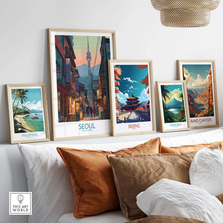 Vibrant travel poster display featuring Seoul, Beijing, Costa Rica, and the Grand Canyon in a modern home setting.