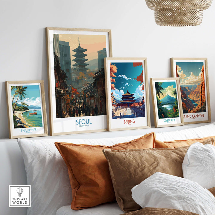Framed wall art collection featuring Seoul, Beijing, Costa Rica, Philippines, and Grand Canyon prints in a cozy room.
