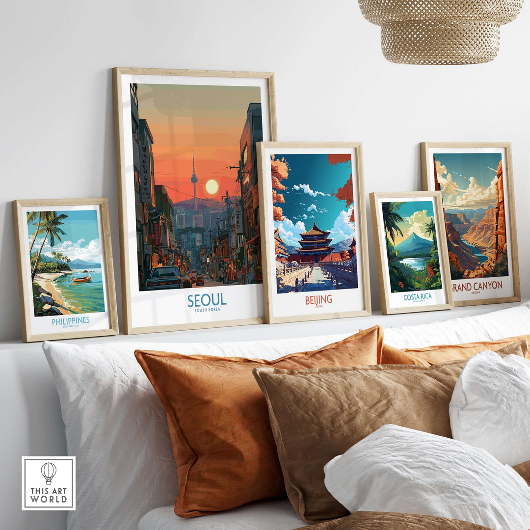 Seoul South Korea wall art travel poster among other travel-themed prints on a stylish living room wall.