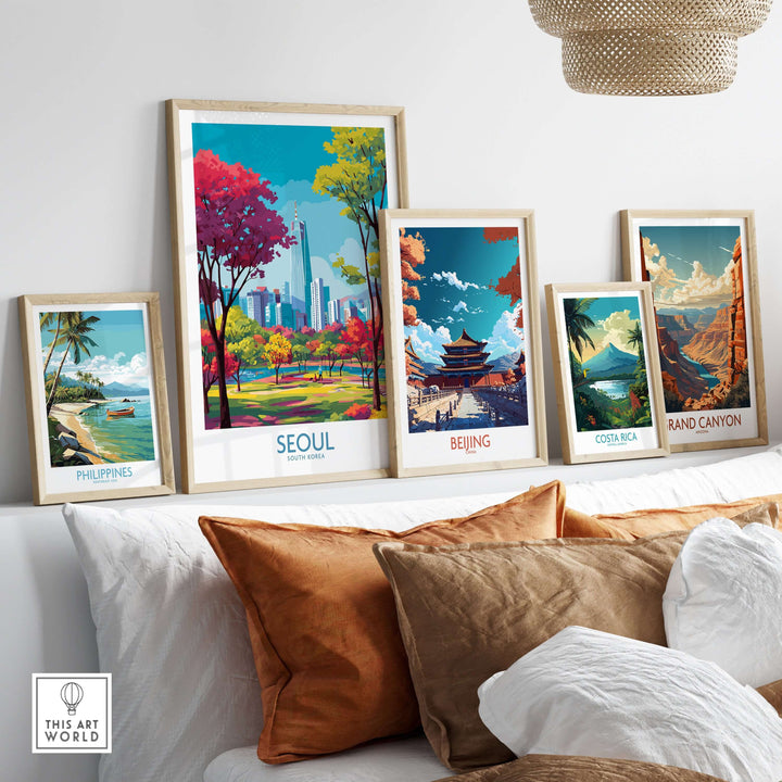 Seoul Wall Art print displayed among other travel-themed artworks on a stylish shelf, showcasing vibrant culture.