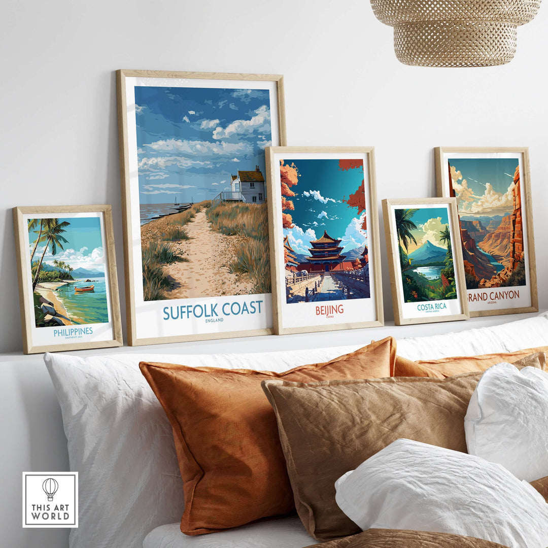 A collection of travel posters featuring Suffolk Coast, Beijing, Costa Rica, and the Grand Canyon, displayed in a stylish setting.