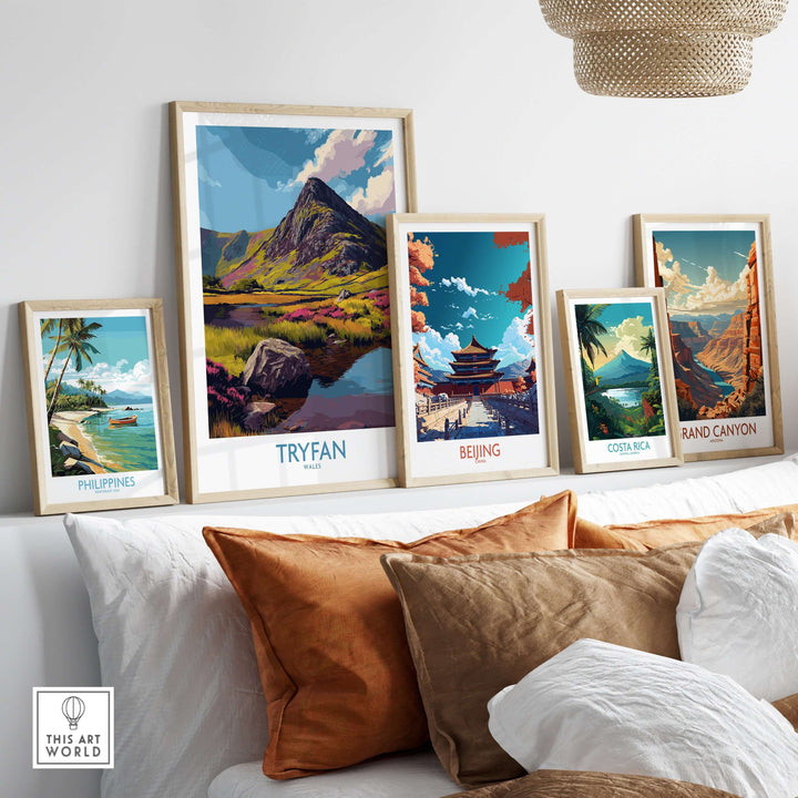 Gallery of travel posters featuring Tryfan, Philippines, Beijing, Costa Rica, and Grand Canyon in a stylish interior setting.