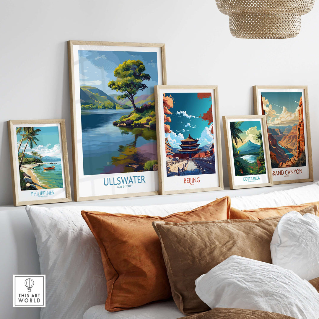 Collection of travel posters including Ullswater, Beijing, Costa Rica, and the Grand Canyon displayed on a wall.