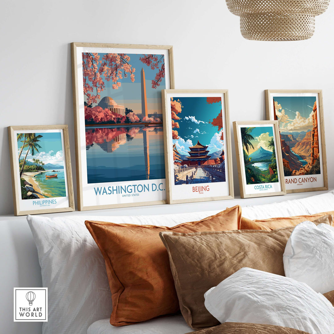 Gallery wall featuring travel posters: Washington D.C. Cherry Blossoms, Beijing, Costa Rica, Philippines, Grand Canyon.