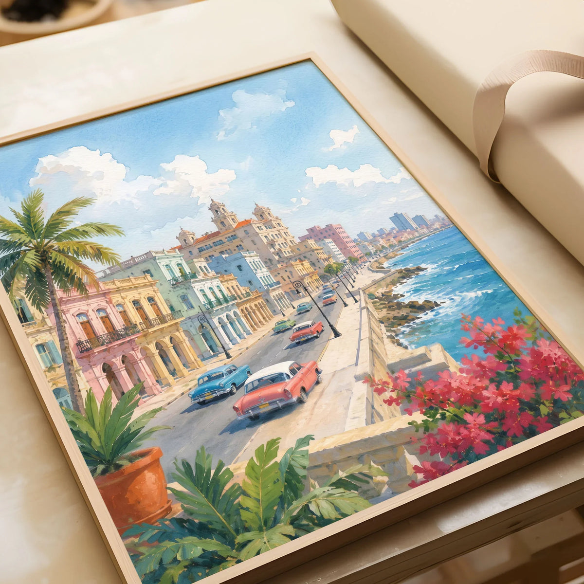 Havana Malecón seafront and classic cars watercolour art print in a natural wood frame, gift close-up