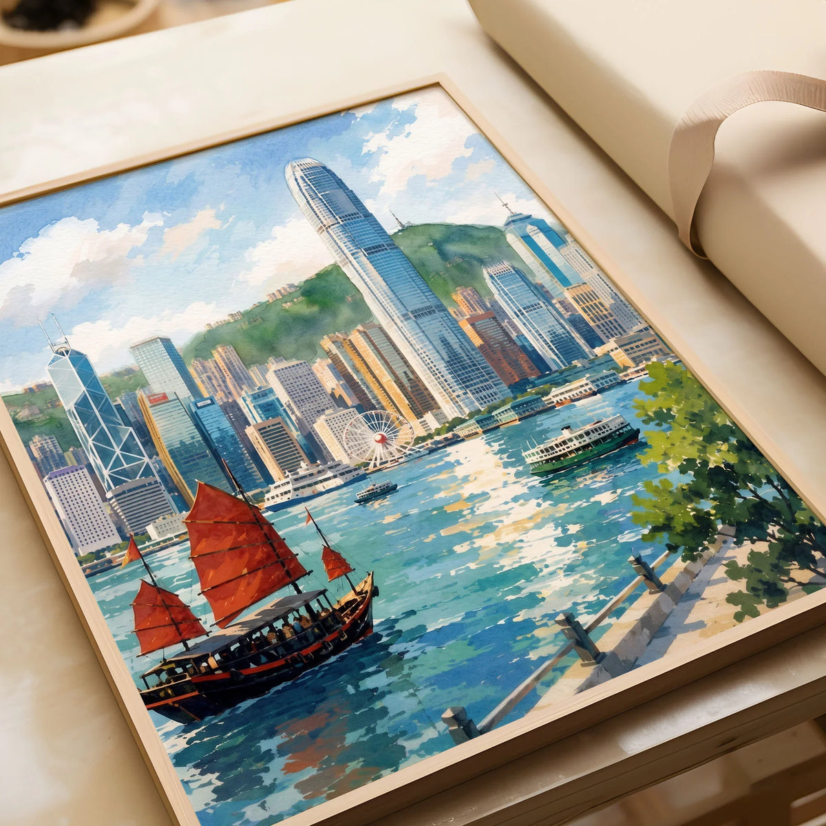 Hong Kong Victoria Harbour and junk boat watercolour art print in a natural wood frame, gift close-up