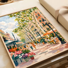 La Rambla Barcelona flower stalls and cafés watercolour art print in a natural wood frame, gift close-up
