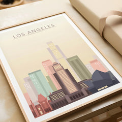 Los Angeles city skyline art print in a natural wood frame, gift close-up