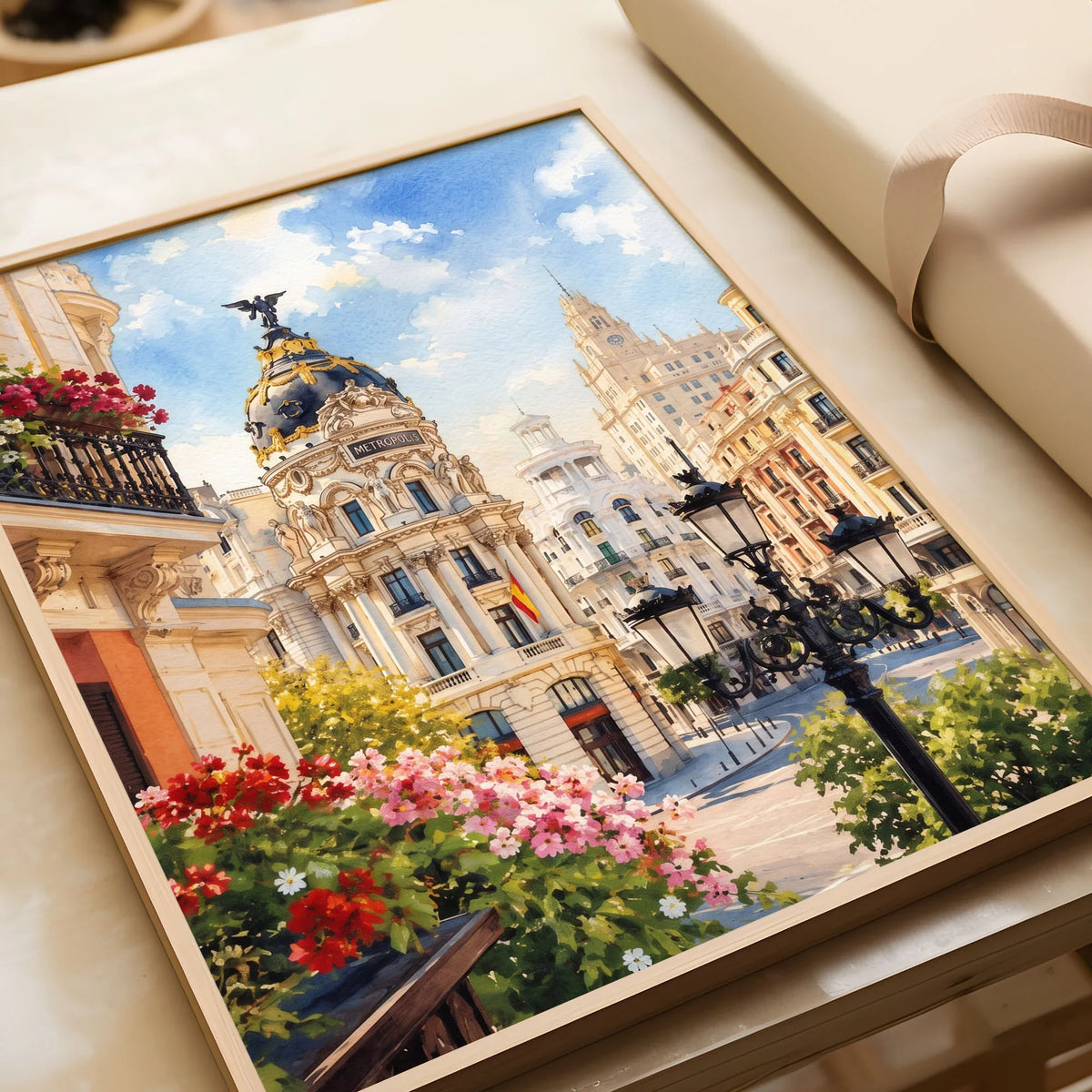 Madrid Metropolis building on Gran Vía watercolour art print in a natural wood frame, gift close-up