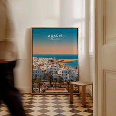 Agadir Travel Poster – City Skyline as a framed canvas leaning in a hallway with a chequered tiled floor