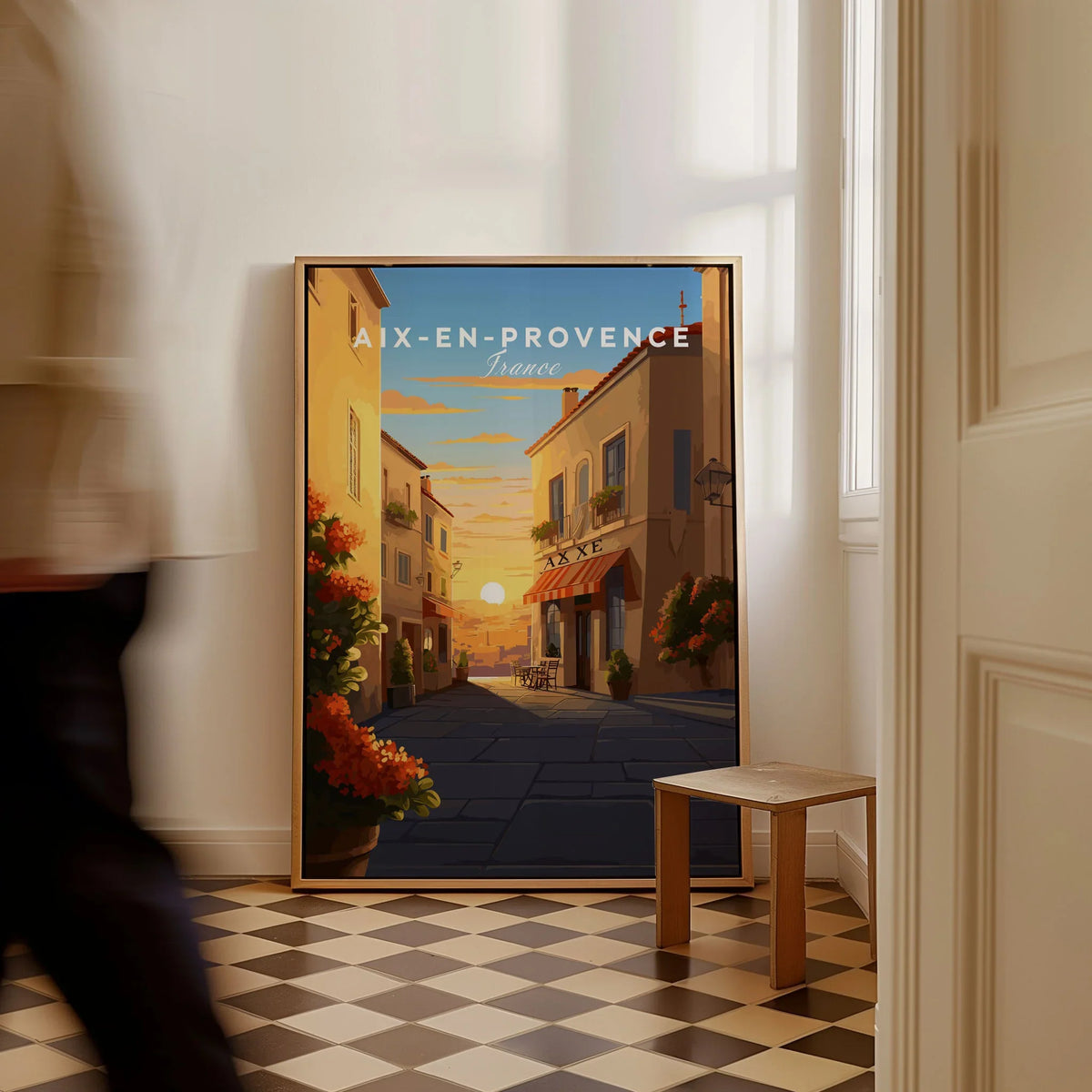 Aix-en-Provence Poster as a framed canvas leaning in a hallway with a chequered tiled floor