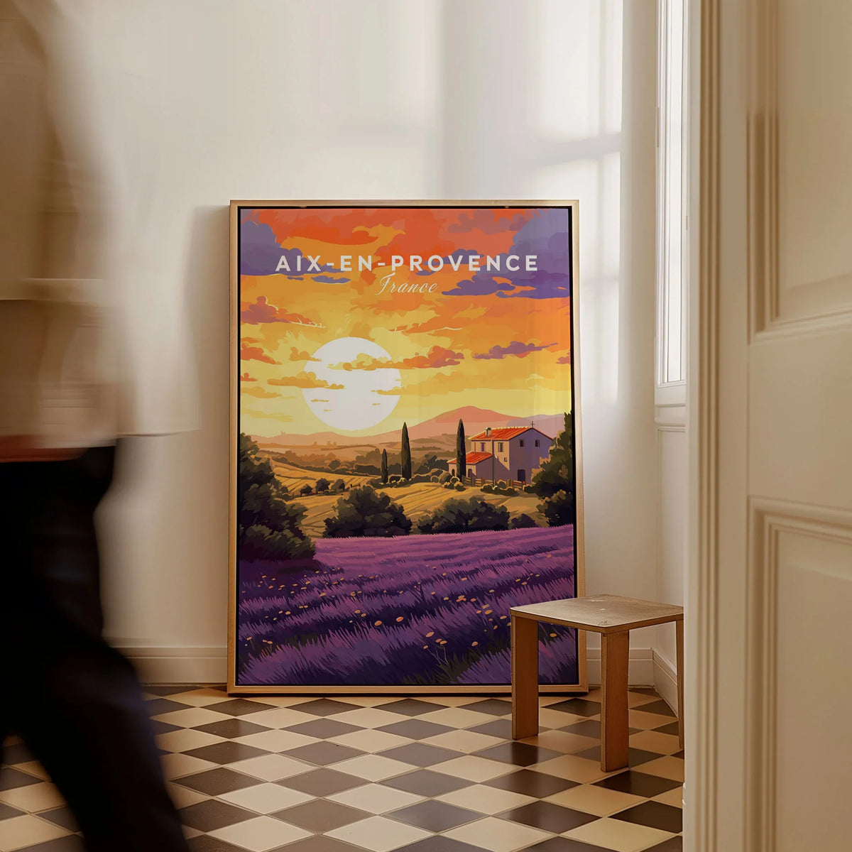Aix-en-Provence Print as a framed canvas leaning in a hallway with a chequered tiled floor