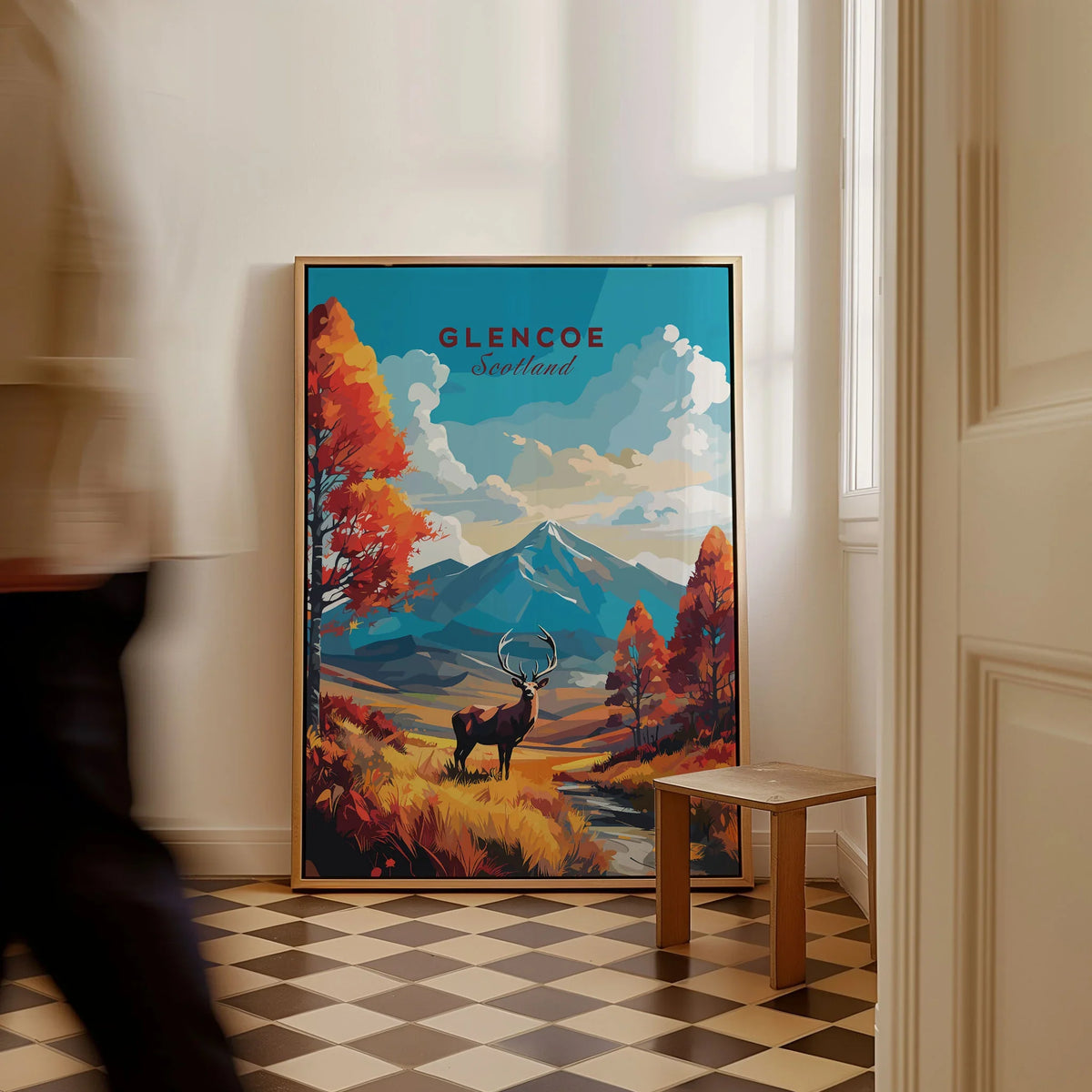 Glencoe Art Print as a framed canvas leaning in a hallway with a chequered tiled floor