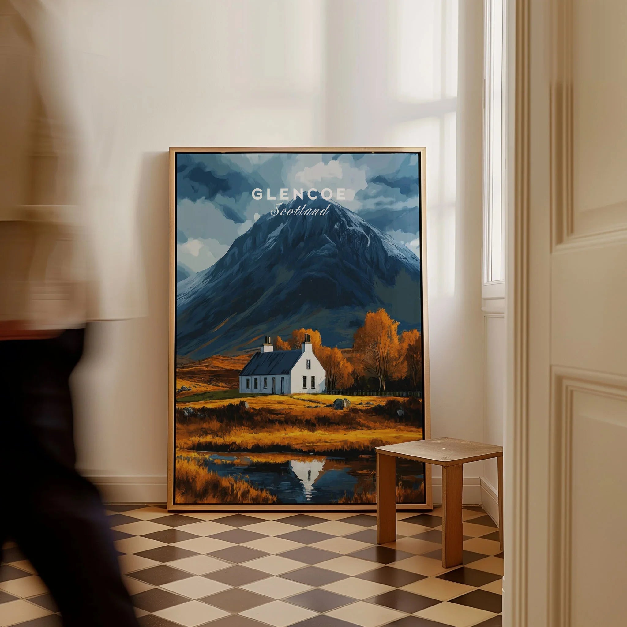 Glencoe Scotland Poster as a framed canvas leaning in a hallway with a chequered tiled floor